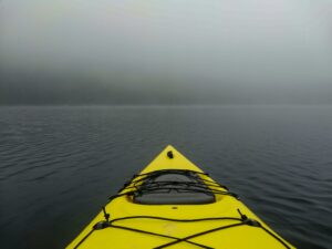 yellow kayak on a calm lake in Terra Nova park