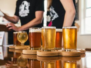 Prince Edward Island boasts a thriving craft beer scene with 10 breweries offering unique brews and some incorporating local ingredients. From award-winning IPAs to refreshing sours, there's a PEI beer to quench any thirst while you explore the island. 