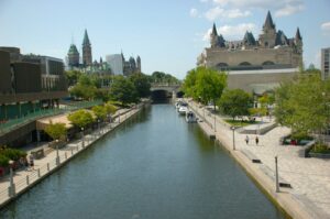 The Rideau Canal is a historic 202-kilometer waterway that stretches from Ottawa, Ontario on the Ottawa River to Kingston, Ontario on Lake Ontario [visitrideaucanal.com]. Constructed between 1826 and 1832, it served as a vital military pathway during a time of tension between the United States and Canada. Today, it's a popular destination for recreational activities and is considered a National Historic Site of Canada.