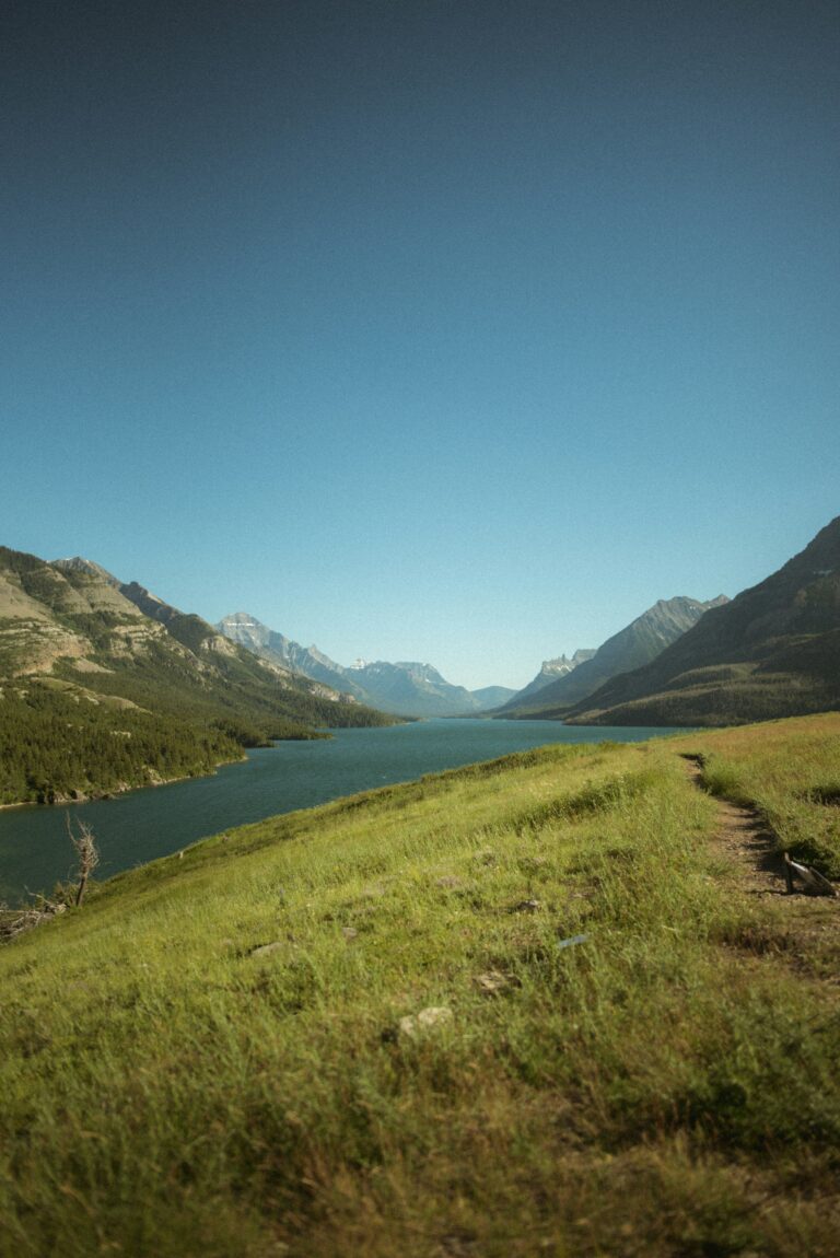 Waterton Lakes National Park river flanked by mountains